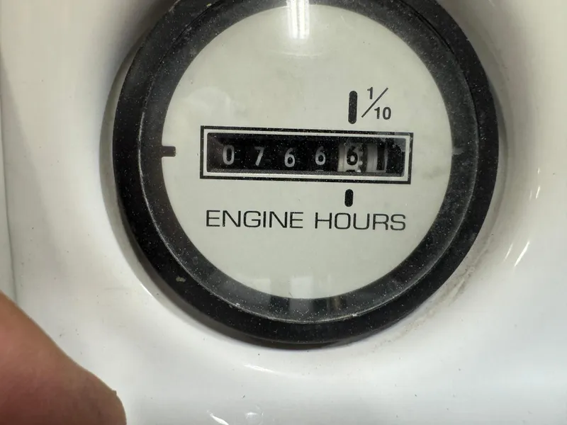 Slide: The Image of Close-up of engine hour meter reading 766.1 on 2004 PlayCraft 2800 Powertoon. - 14