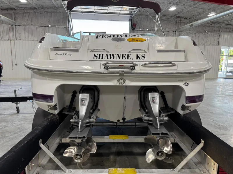 Slide: The Image of Rear view of a 2000 Cobalt 292 boat on a trailer in a garage. - 5