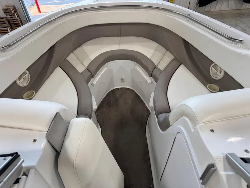 Slide: The Image of Interior of a 2000 Cobalt 292 boat with white and gray seating. - 9