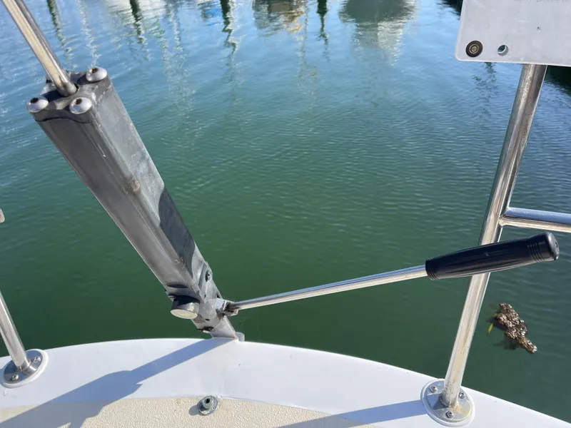 Slide: The Image of Close-up of a CAL 40 sailboat's deck hardware, 1964 model, with water reflection. - 17