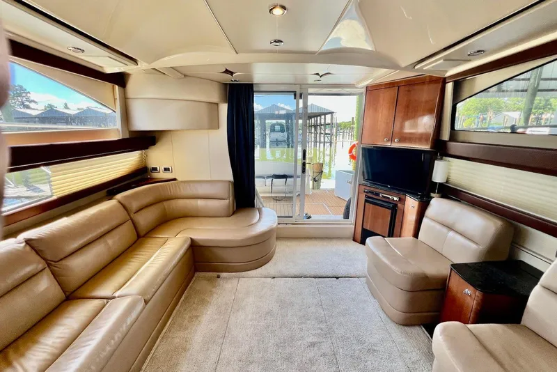 Slide: The Image of Luxurious interior of a 2008 Meridian 391 Sedan yacht with leather seating and modern amenities. - 11