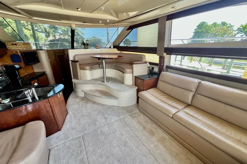 Slide: The Image of Luxurious interior of a 2008 Meridian 391 Sedan yacht with plush seating and elegant design. - 14