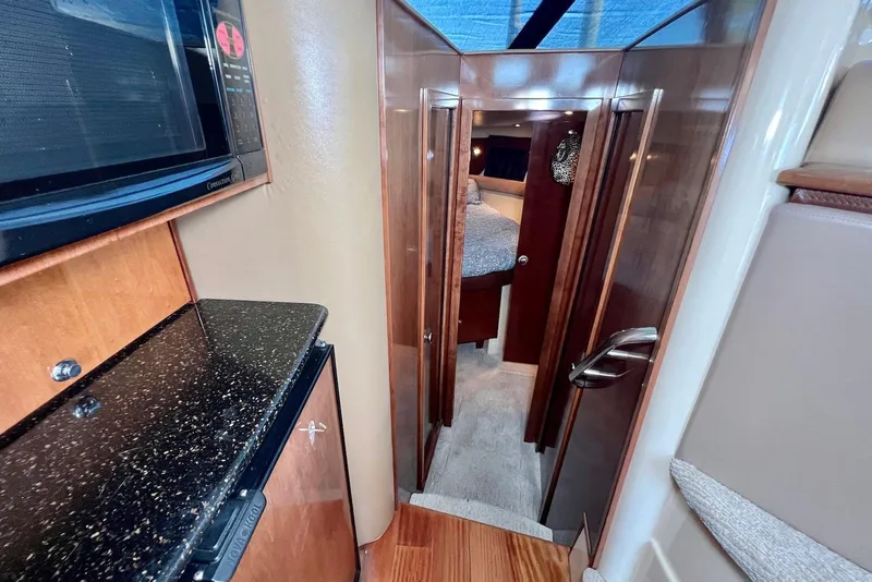 Slide: The Image of 2008 Meridian 391 Sedan interior with wood finishes and modern amenities. - 22