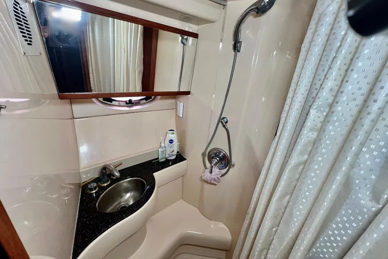 Slide: The Image of 2008 Meridian 391 Sedan bathroom with sink, mirror, and shower area. - 31