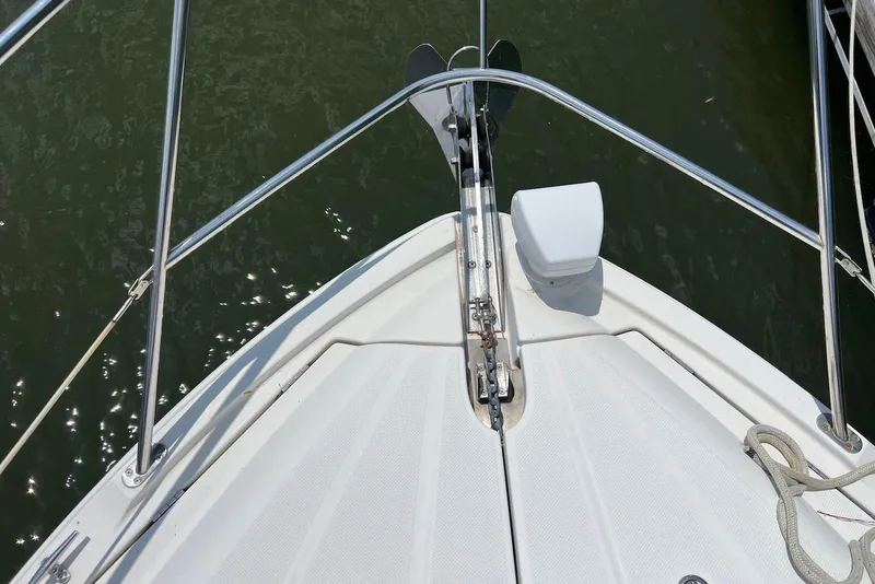 Slide: The Image of Bow view of 2008 Meridian 391 Sedan yacht with anchor and railing. - 9