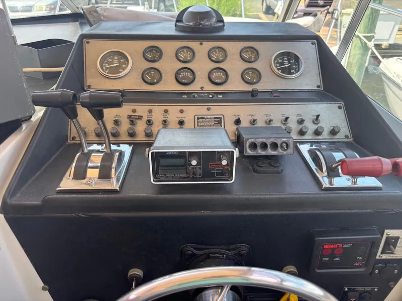 Slide: The Image of Control panel of 1987 Chris-Craft 336 Amerosport boat with gauges and switches. - 18