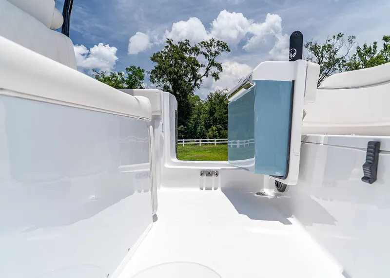 Slide: The Image of Interior view of 2026 Sea Hunt Ultra 245 SE boat, showcasing sleek design and spacious layout. - 9