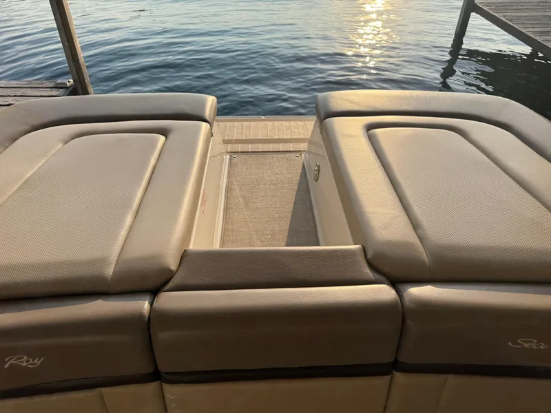 Slide: The Image of Rear view of a 2012 Sea Ray 270 SLX boat with sunlit water background. - 24