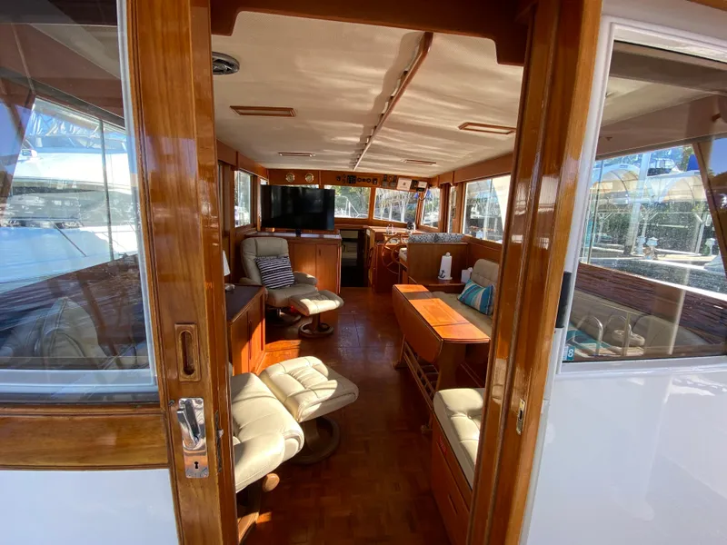 Slide: The Image of Interior of 1992 Grand Banks 46 Europa yacht with wooden furnishings and seating. - 20