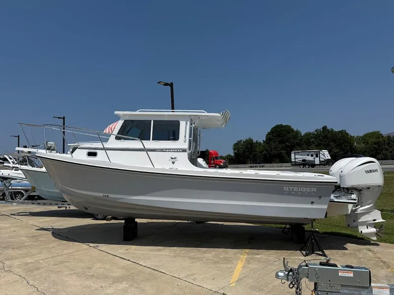 The Image of 2026 Steiger Craft 28 Fisherman boat with Yamaha engine on display outdoors. - 0