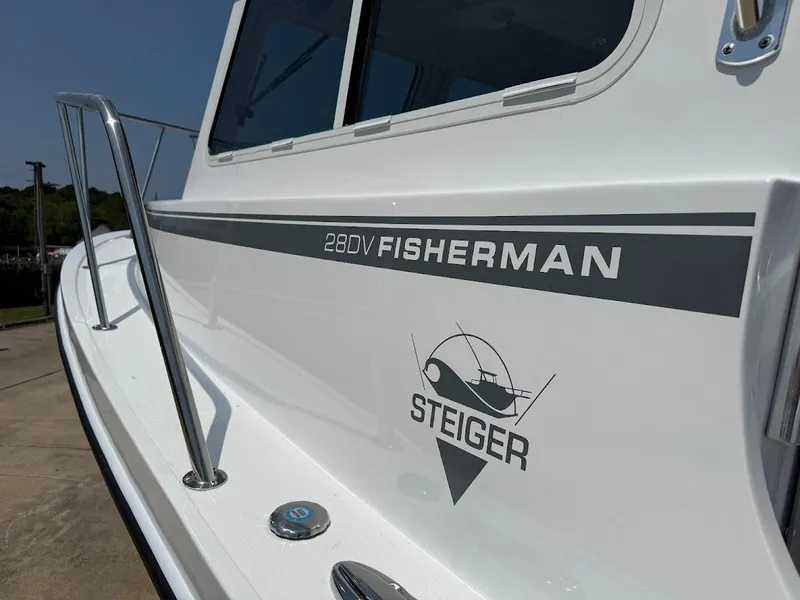 Slide: The Image of 2026 Steiger Craft 28 Fisherman boat, side view with logo and model name. - 17