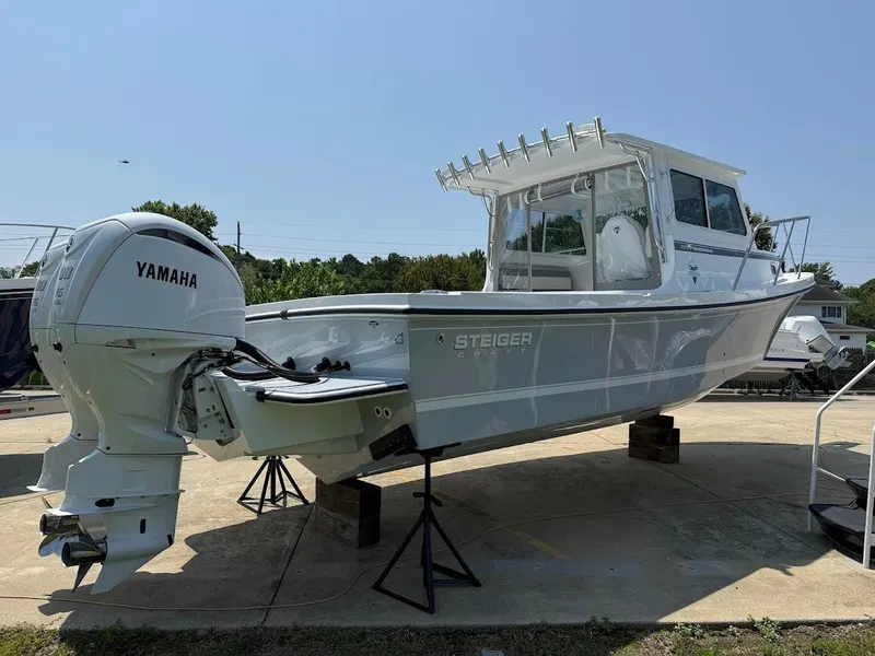 Slide: The Image of 2026 Steiger Craft 28 Fisherman boat with Yamaha engine on display. - 3