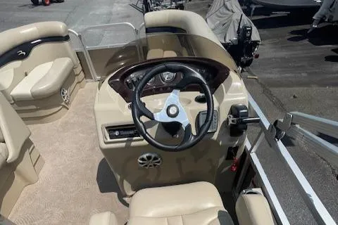 Slide: The Image of 2011 Bennington LSI boat interior with steering wheel and seating. - 9