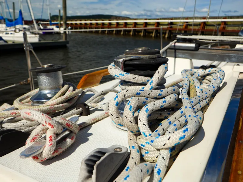 Slide: The Image of Close-up of ropes and winches on a 1987 Sabre 36 Sloop sailboat deck. - 16