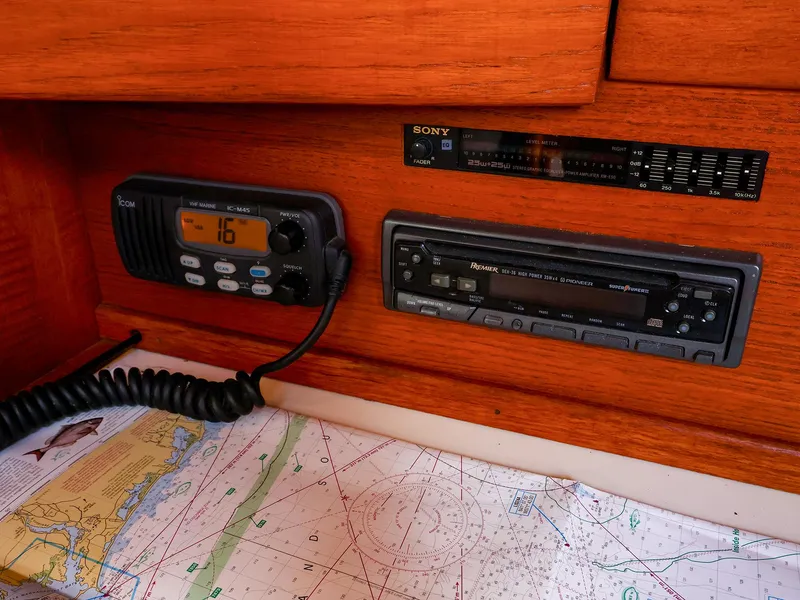 Slide: The Image of Control panel of a 1987 Sabre 36 Sloop with radio and navigation equipment. - 22