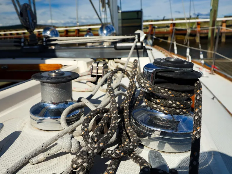 Slide: The Image of Close-up of winches and ropes on a 1987 Sabre 36 Sloop sailboat deck. - 14