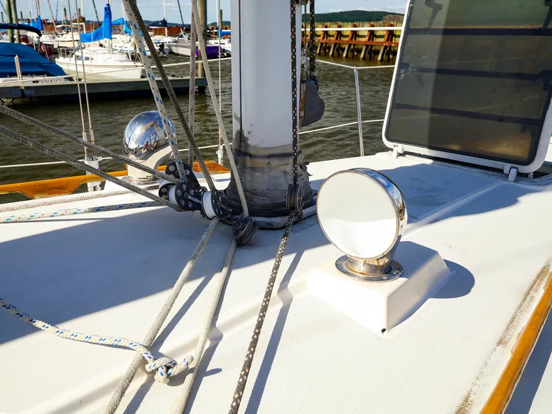 Slide: The Image of 1987 Sabre 36 Sloop deck with rigging and winch, docked at marina. - 8