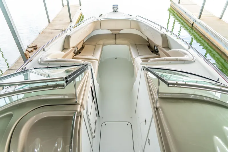 Slide: The Image of 2012 Formula 310 Bowrider boat interior with spacious seating and open deck. - 30