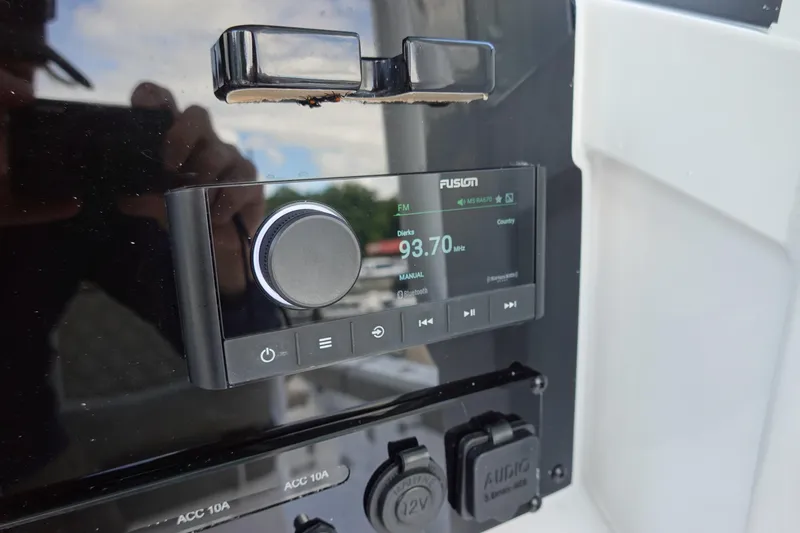 Slide: The Image of Fusion audio system on 2026 Sea Hunt Ultra 265 SE boat dashboard. - 25