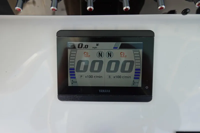 Slide: The Image of Yamaha display on 2026 Sea Hunt Ultra 265 SE boat dashboard, showing speed and RPM. - 28
