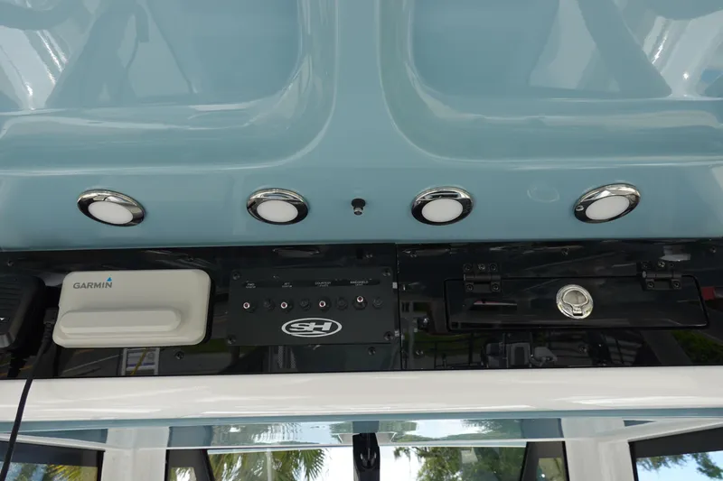 Slide: The Image of Control panel of 2026 Sea Hunt Ultra 265 SE boat with Garmin device. - 29