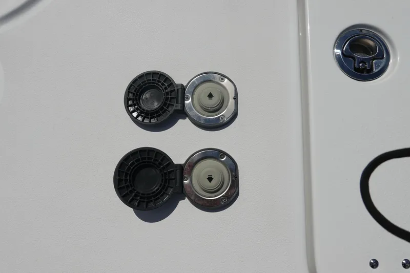 Slide: The Image of Fuel and water inlets on 2026 Sea Hunt Ultra 265 SE boat. - 39