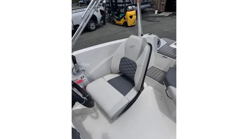 Slide: The Image of 2025 Starcraft SVX 171 OB boat interior with cushioned seating and modern design. - 6