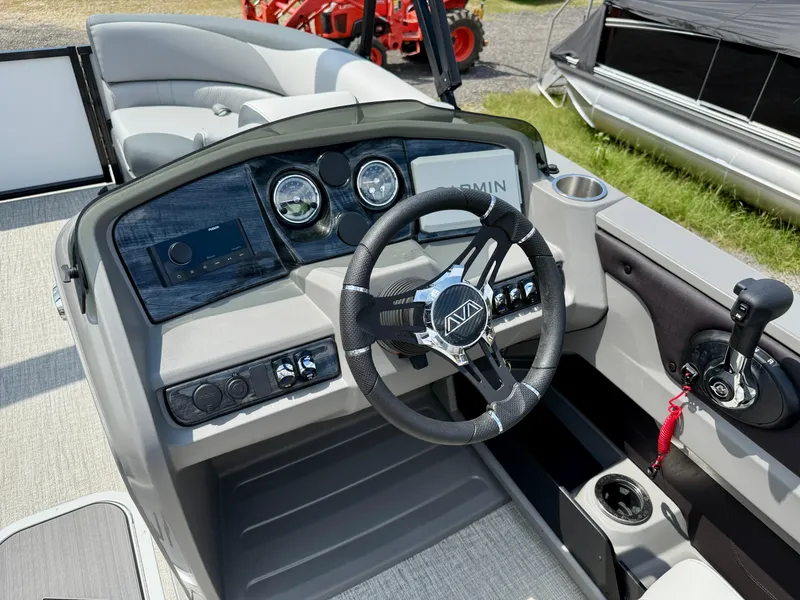 Slide: The Image of 2025 Avalon LSZ Quad Lounger Shift dashboard with steering wheel and controls. - 4