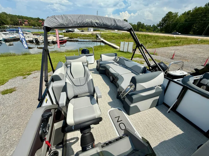 Slide: The Image of 2025 Avalon LSZ Quad Lounger Shift pontoon boat with spacious seating and modern design. - 5