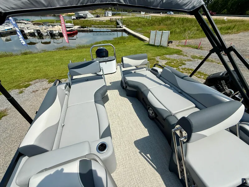 Slide: The Image of 2025 Avalon LSZ Quad Lounger Shift pontoon boat with spacious seating and modern design. - 7