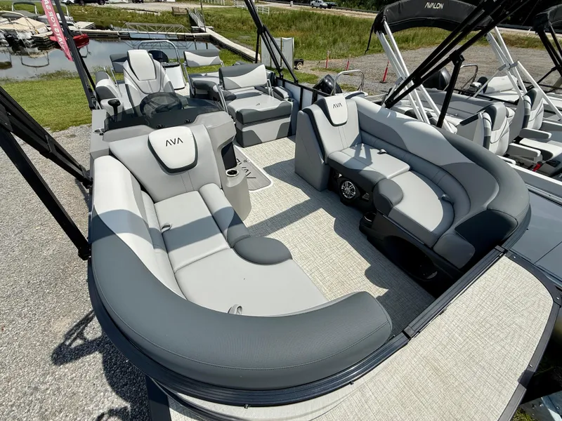 Slide: The Image of 2025 Avalon LSZ Quad Lounger Shift pontoon boat with luxurious seating and modern design. - 9