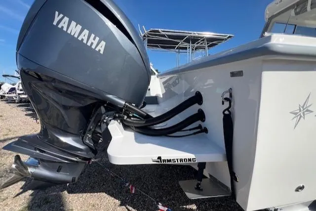 Slide: The Image of 2026 NorthCoast 255 HT boat with Yamaha outboard motor and Armstrong bracket. - 12