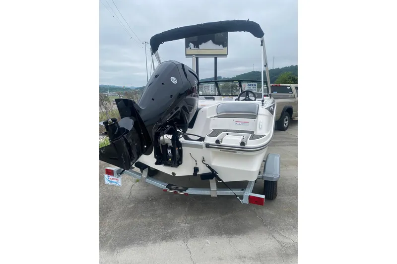 Slide: The Image of 2025 Bayliner Element M17 boat on trailer, rear view with outboard motor. - 4