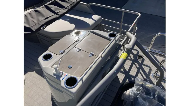 Slide: The Image of 2025 Starcraft CX 23 RL boat interior with seating and storage compartments. - 9