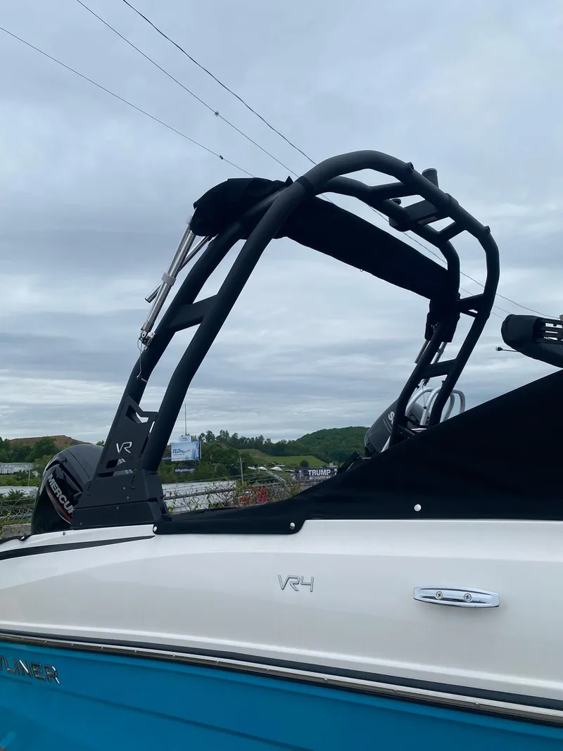 Slide: The Image of 2025 Bayliner VR4 Bowrider OB with sleek design and modern features. - 5