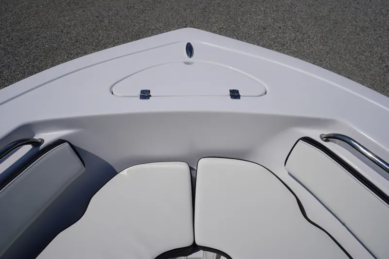 Slide: The Image of 2026 Tidewater 198 CC Adventure boat bow seating with storage compartment. - 5