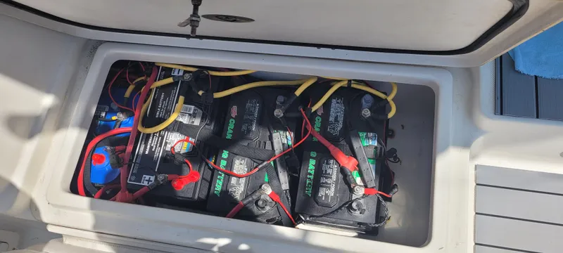 Slide: The Image of Battery compartment of a 2015 Century 30 boat with multiple connected batteries. - 22