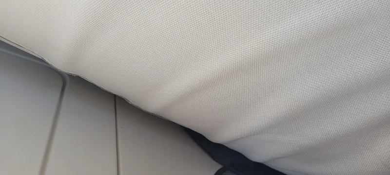 Slide: The Image of White cushioned seat on a 2015 Century 30 boat. - 46
