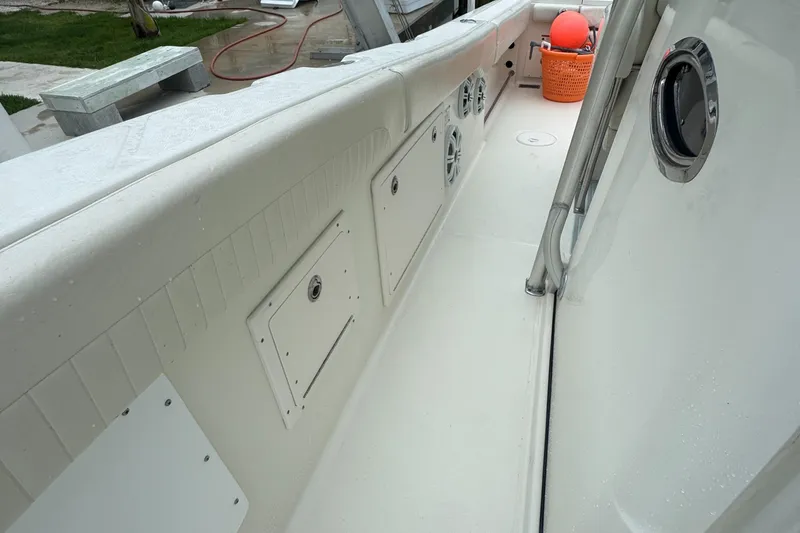 Slide: The Image of 2006 Hydra-Sports Vector 2900 CC boat interior with storage compartments and speakers. - 10