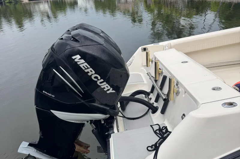 Slide: The Image of 2006 Hydra-Sports Vector 2900 CC with Mercury outboard engine on calm water. - 11