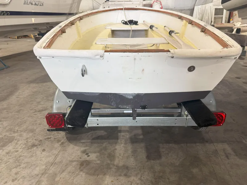 Slide: The Image of 1978 OKEAN Sumner 9 boat on trailer in indoor storage facility. - 3