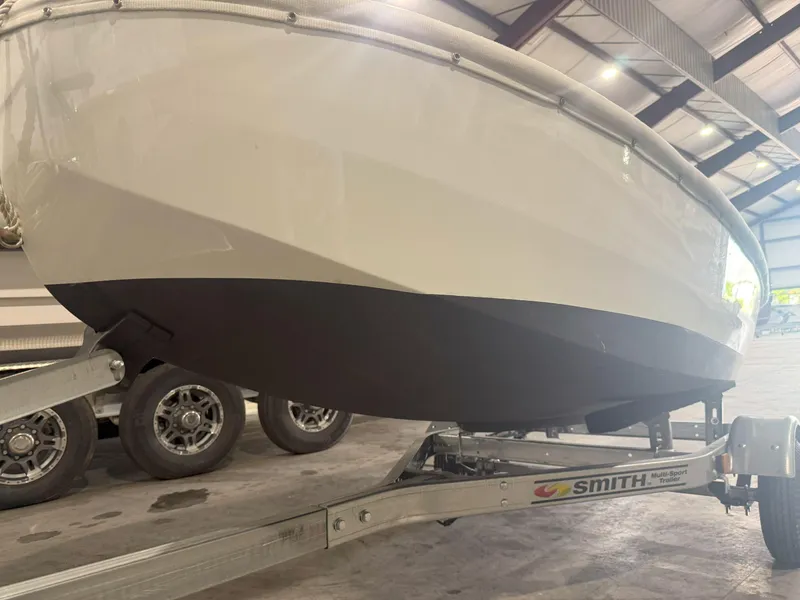 Slide: The Image of 1978 OKEAN Sumner 9 boat on Smith trailer in indoor storage facility. - 5