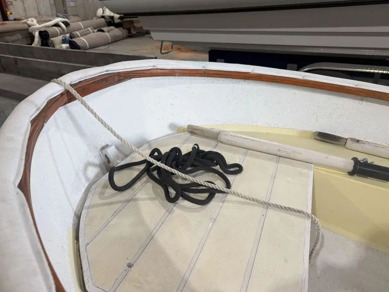 Slide: The Image of Interior of a 1978 OKEAN Sumner 9 boat with rope and oar. - 6