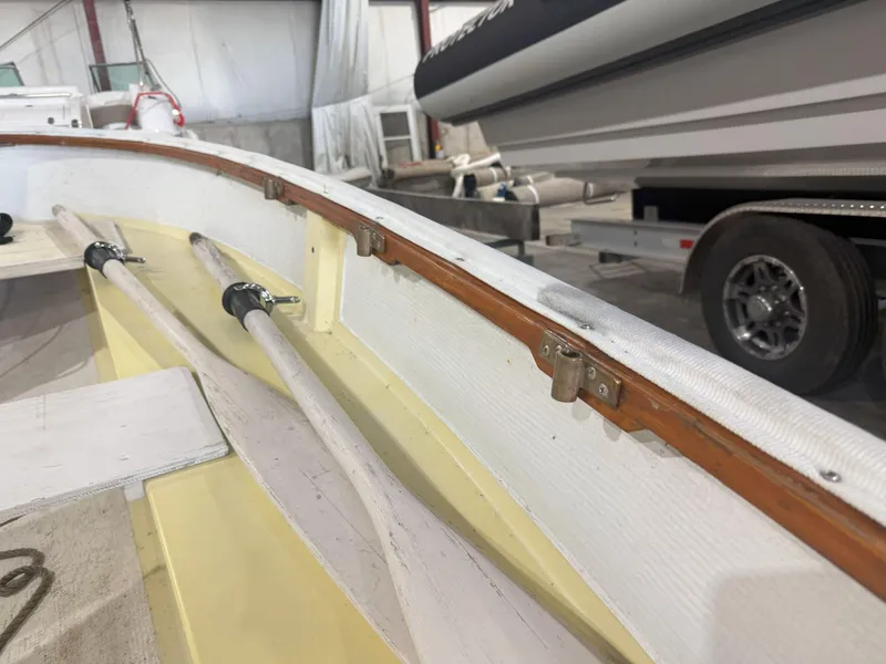 Slide: The Image of Interior view of a 1978 OKEAN Sumner 9 boat with wooden oars and fittings. - 8