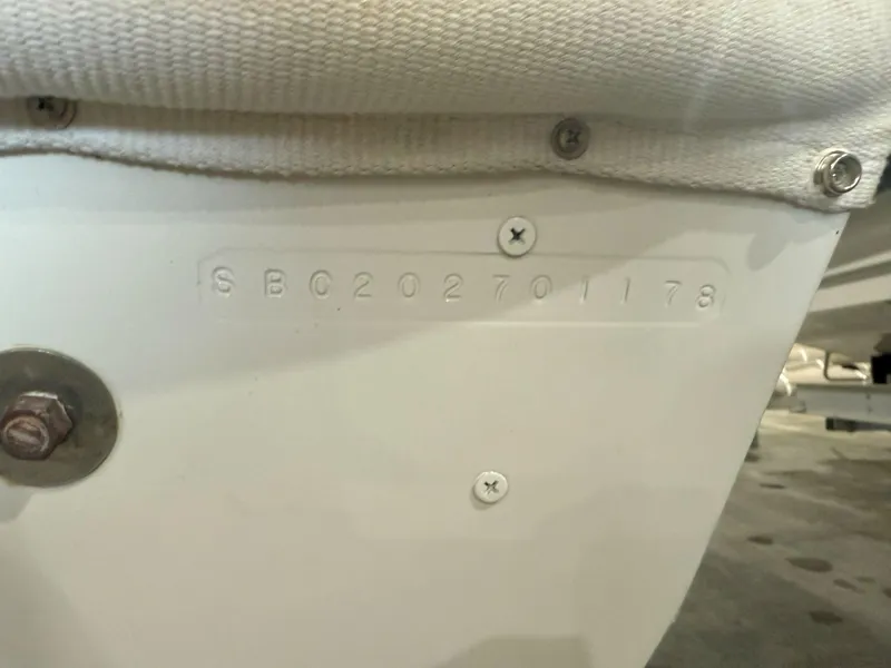 Slide: The Image of Hull identification number on 1978 OKEAN Sumner 9 boat, showing "SBC202701178". - 9