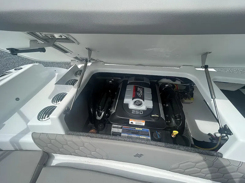 Slide: The Image of 2025 Four Winns H1 Freedom boat engine compartment with 4.5L 250 horsepower engine. - 8