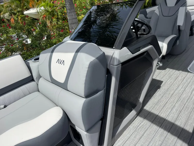 Slide: The Image of 2025 Avalon Catalina Platinum Quad Lounge interior with sleek gray seating and modern design. - 16