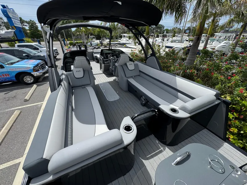 Slide: The Image of 2025 Avalon Catalina Platinum Quad Lounge boat with sleek seating and modern design. - 33