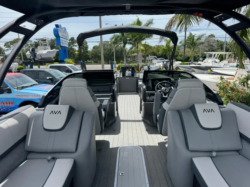 Slide: The Image of 2025 Avalon Catalina Platinum Quad Lounge boat interior with luxurious seating and modern design. - 34