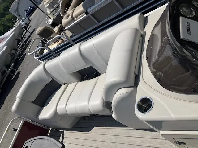 Slide: The Image of Luxurious seating on 2021 G3 Suncatcher Fusion 322RC pontoon boat, featuring cup holders. - 8